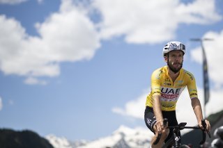 Adam Yates reste en jaune KEYSTONE/GIAN EHRENZELLER